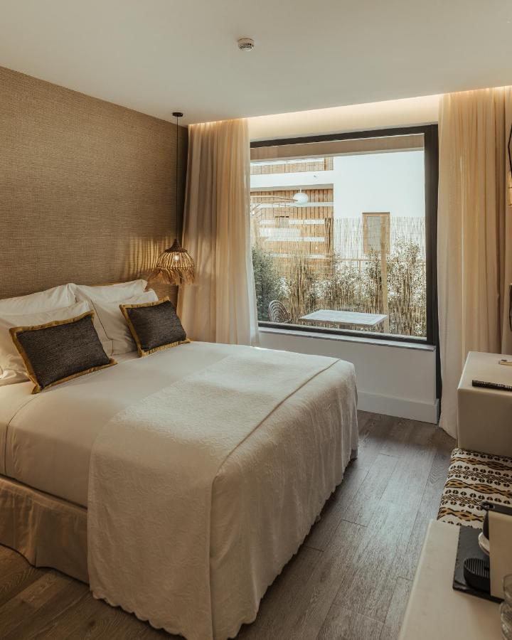 Chambre Double ou Lits Jumeaux Deluxe – Vue sur Jardin